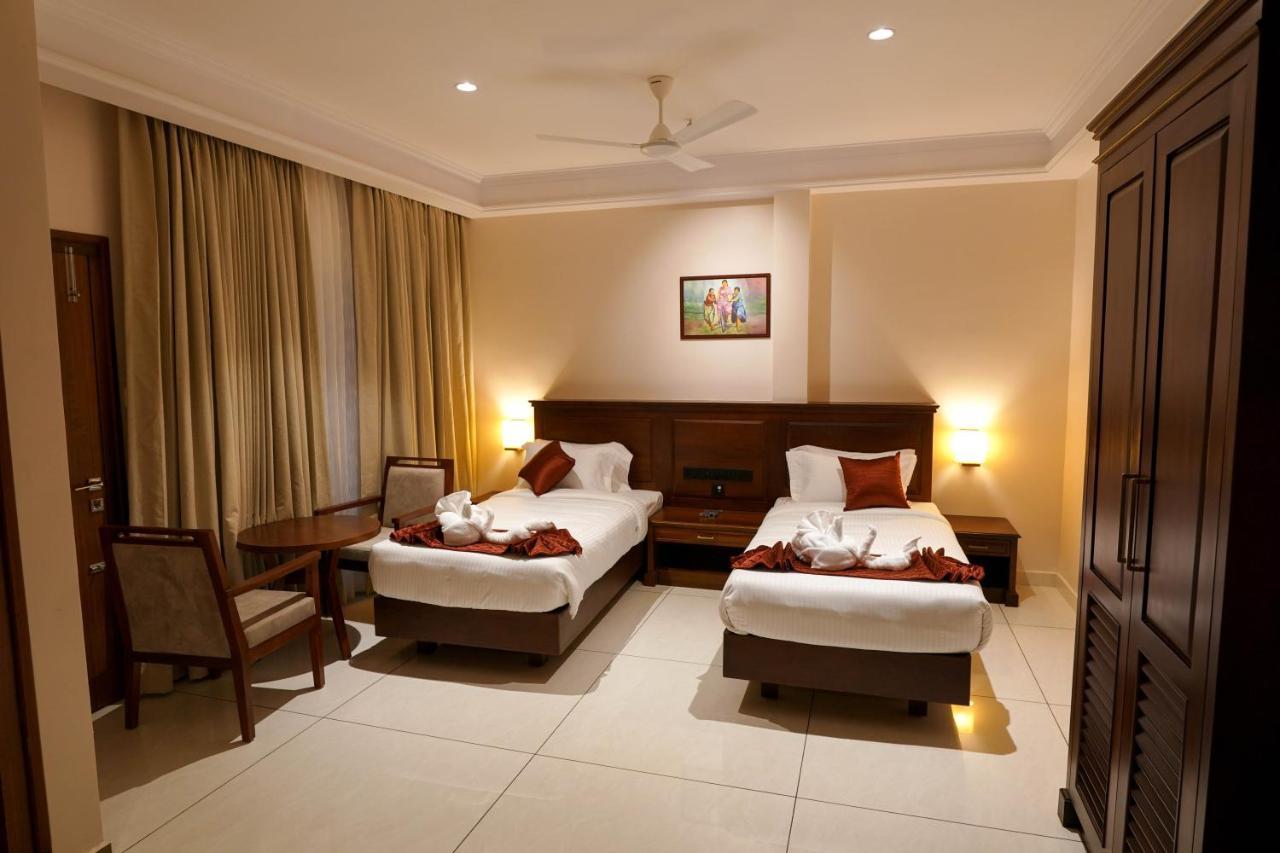 Hotel Heritage Plaza Kottayam Buitenkant foto
